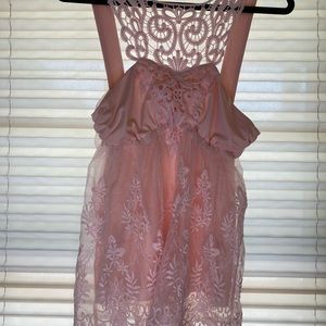 Pink sleeveless blouse with lace